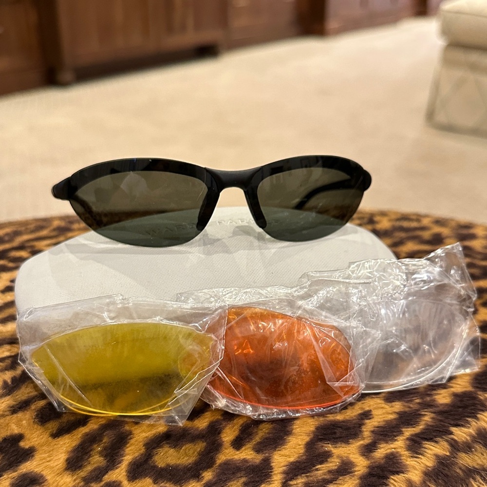 Native Sunglasses with Black Frames and Green Lenses